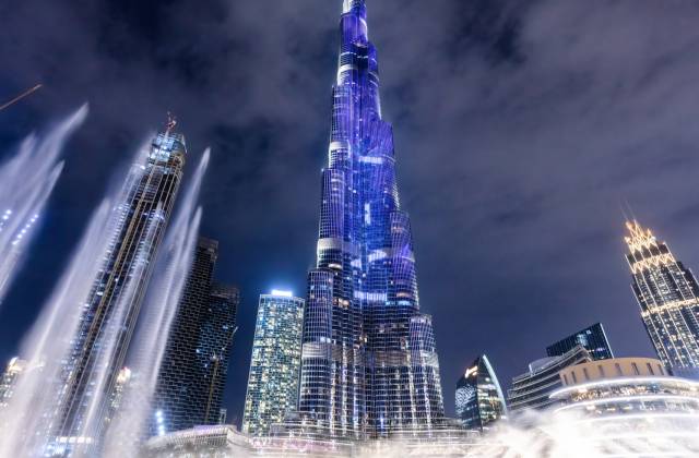 Burj Khalifa illumination with fountain show in Dubai UAE at night