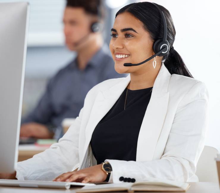 Happy woman, call center and computer with headset in telemarketing, customer service or support at.